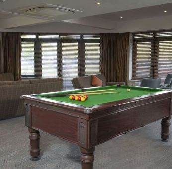 Game room with pool table at DoubleTree By Hilton Oxford Belfry.