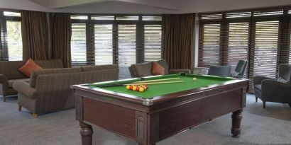 Game room with pool table at DoubleTree By Hilton Oxford Belfry.