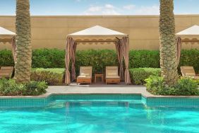 Pool cabanas at Hilton Dubai Al Habtoor City.