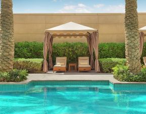 Pool cabanas at Hilton Dubai Al Habtoor City.