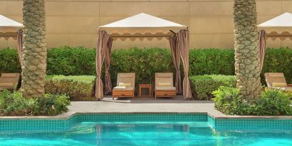 Pool cabanas at Hilton Dubai Al Habtoor City.