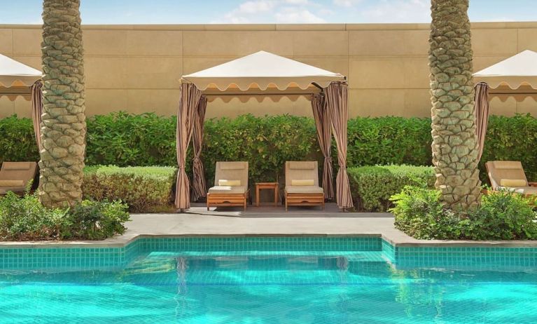 Pool cabanas at Hilton Dubai Al Habtoor City.