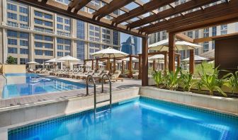 Three outdoor pools at Hilton Dubai Al Habtoor City.