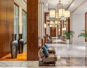 Lobby and hotel entrance at Hilton Dubai Al Habtoor City.