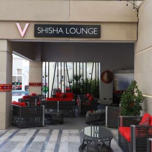 Street-side hotel lounge and restaurant at V Hotel Dubai.