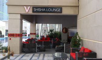 Street-side hotel lounge and restaurant at V Hotel Dubai.