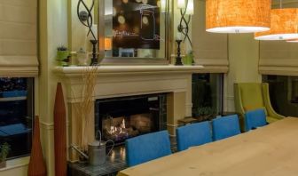 Lobby and coworking space with fire place at Hilton Garden Inn Kennett Square.