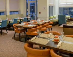Dining room and coworking space at Hilton Garden Inn Kennett Square.