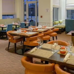 Dining room and coworking space at Hilton Garden Inn Kennett Square.