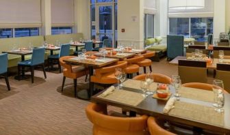 Dining room and coworking space at Hilton Garden Inn Kennett Square.