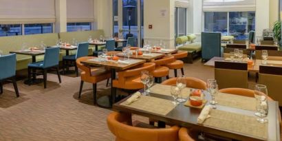 Dining room and coworking space at Hilton Garden Inn Kennett Square.