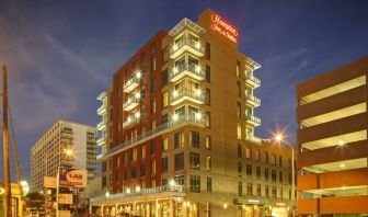 Hotel exterior at night at Hampton Inn & Suites Austin @ The UniversityCapitol.