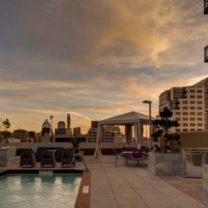 Outdoor pool at sunset at Hampton Inn & Suites Austin @ The UniversityCapitol.