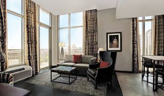 Spacious king room with natural light at Hampton Inn & Suites Austin @ The UniversityCapitol.