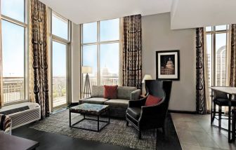 Spacious king room with natural light at Hampton Inn & Suites Austin @ The UniversityCapitol.