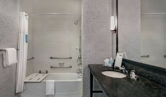 Guest bathroom with shower at Hampton Inn & Suites Austin @ The UniversityCapitol.