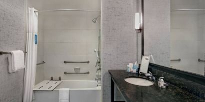 Guest bathroom with shower at Hampton Inn & Suites Austin @ The UniversityCapitol.