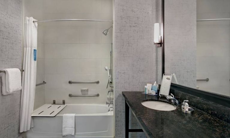 Guest bathroom with shower at Hampton Inn & Suites Austin @ The UniversityCapitol.