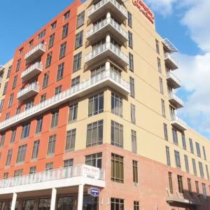 Hotel exterior by day at Hampton Inn & Suites Austin @ The UniversityCapitol.