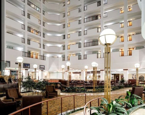 Lobby and lounge at Embassy Suites By Hilton Portland Airport.