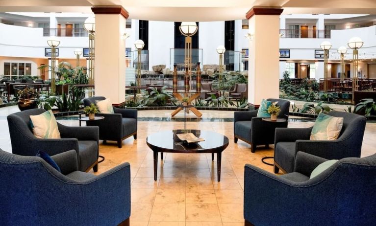 Coworking space and lobby at Embassy Suites By Hilton Portland Airport.