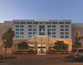 Hotel exterior and parking at Embassy Suites By Hilton Portland Airport.