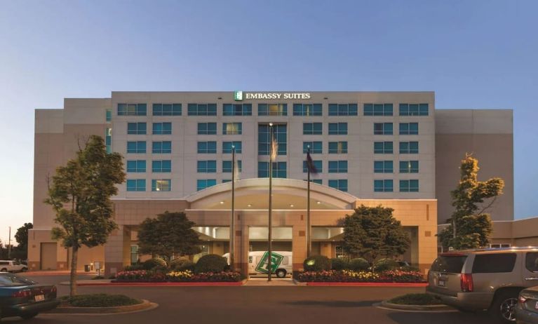 Hotel exterior and parking at Embassy Suites By Hilton Portland Airport.