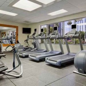 Fitness center at Embassy Suites By Hilton San Diego-La Jolla.