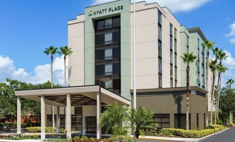 Hotel exterior and parking at Hyatt Place Orlando I-Drive.