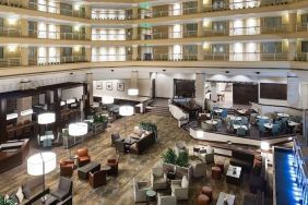 Lobby and coworking space at Embassy Suites By Hilton Denver Tech Center.