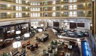 Lobby and coworking space at Embassy Suites By Hilton Denver Tech Center.