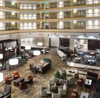 Lobby and coworking space at Embassy Suites By Hilton Denver Tech Center.