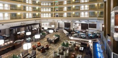 Lobby and coworking space at Embassy Suites By Hilton Denver Tech Center.