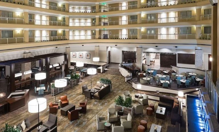 Lobby and coworking space at Embassy Suites By Hilton Denver Tech Center.