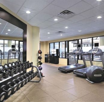 Fitness center at Embassy Suites By Hilton Denver Tech Center.