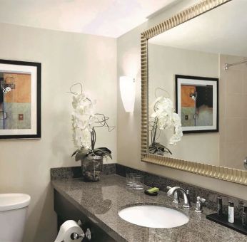 Guest bathroom at Embassy Suites By Hilton Denver Tech Center.