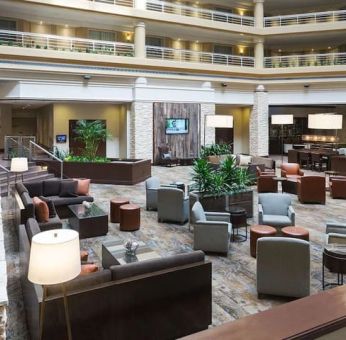 Lobby and lounge at Embassy Suites By Hilton Denver Tech Center.