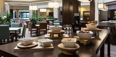 Dining room at Embassy Suites By Hilton Denver Tech Center.