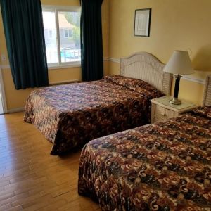 Day use room with two double beds at Bay Breeze Motel.