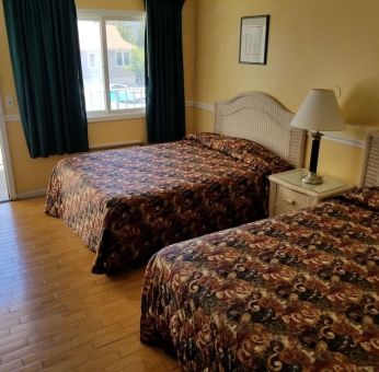 Day use room with two double beds at Bay Breeze Motel.