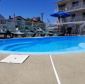 Outdoor pool at Bay Breeze Motel.