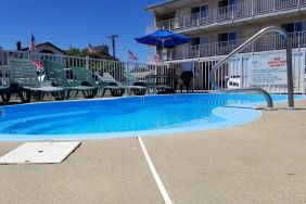 Relaxing outdoor pool at Bay Breeze Motel.