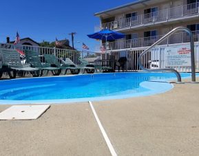 Relaxing outdoor pool at Bay Breeze Motel.