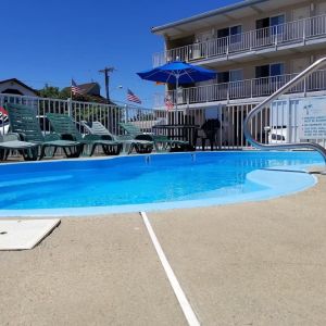 Relaxing outdoor pool at Bay Breeze Motel.