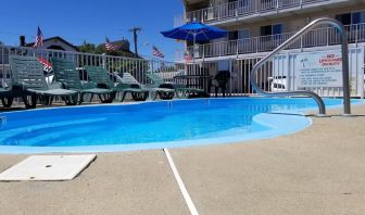 Relaxing outdoor pool at Bay Breeze Motel.