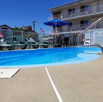 Relaxing outdoor pool at Bay Breeze Motel.