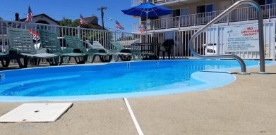 Relaxing outdoor pool at Bay Breeze Motel.