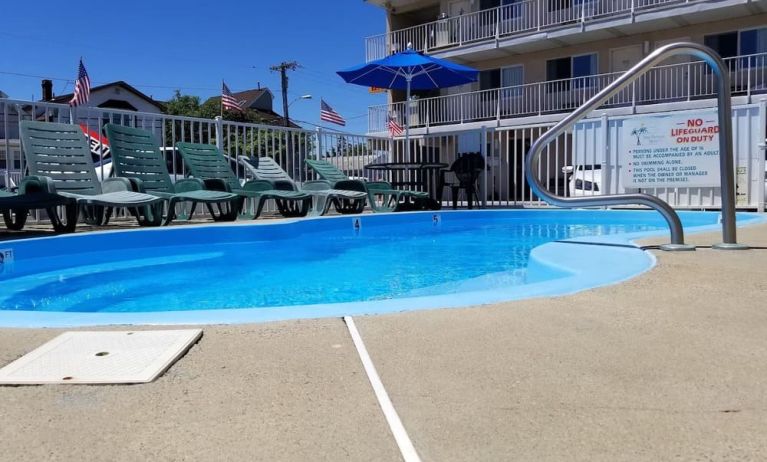 Relaxing outdoor pool at Bay Breeze Motel.