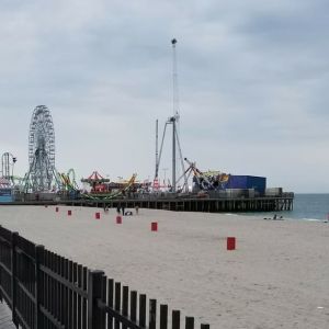 Beach arcade and promenade nearby at Bay Breeze Motel.