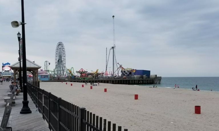 Beach arcade and promenade nearby at Bay Breeze Motel.